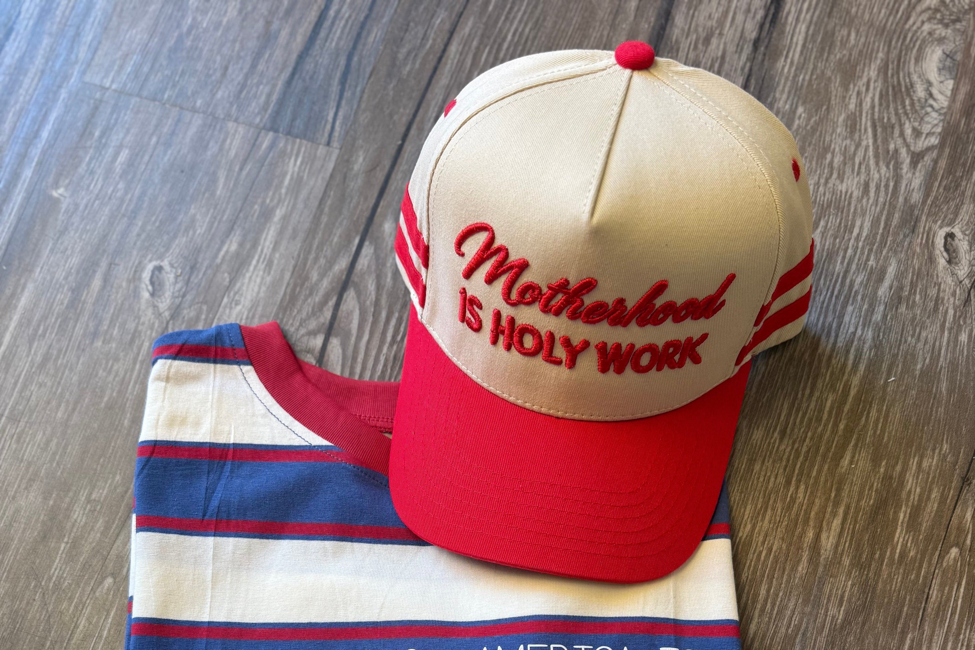 Cap and towel set with text on a wooden surface